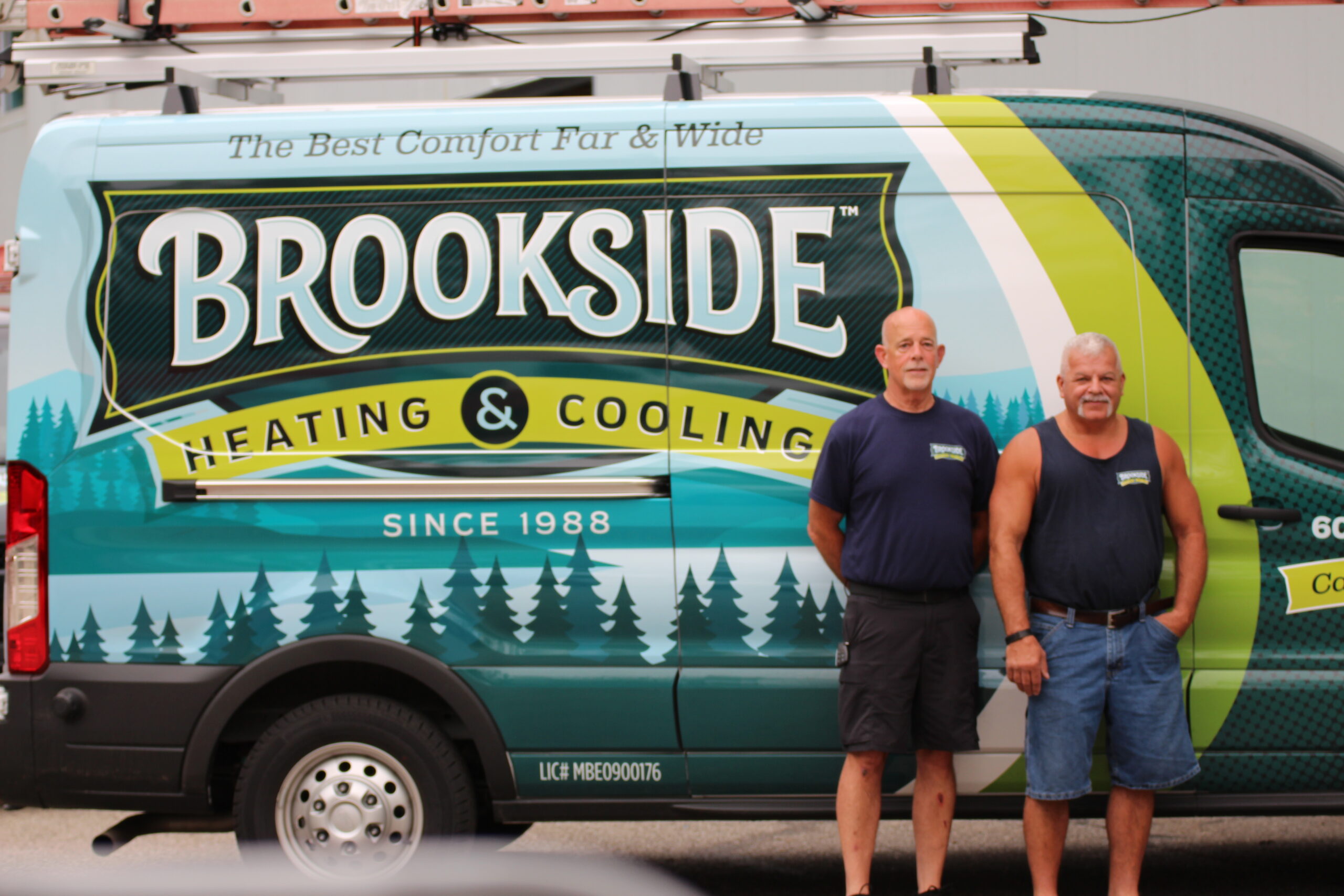 Branded HVAC service van with 'Brookside Heating & Cooling' logo and 'The Best Comfort Far & Wide' tagline